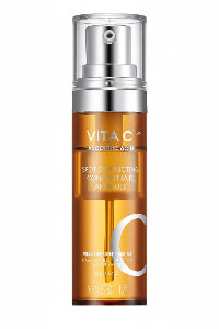 Skincare serum bottle with 'VITAC' and 'Missha' branding on a white background