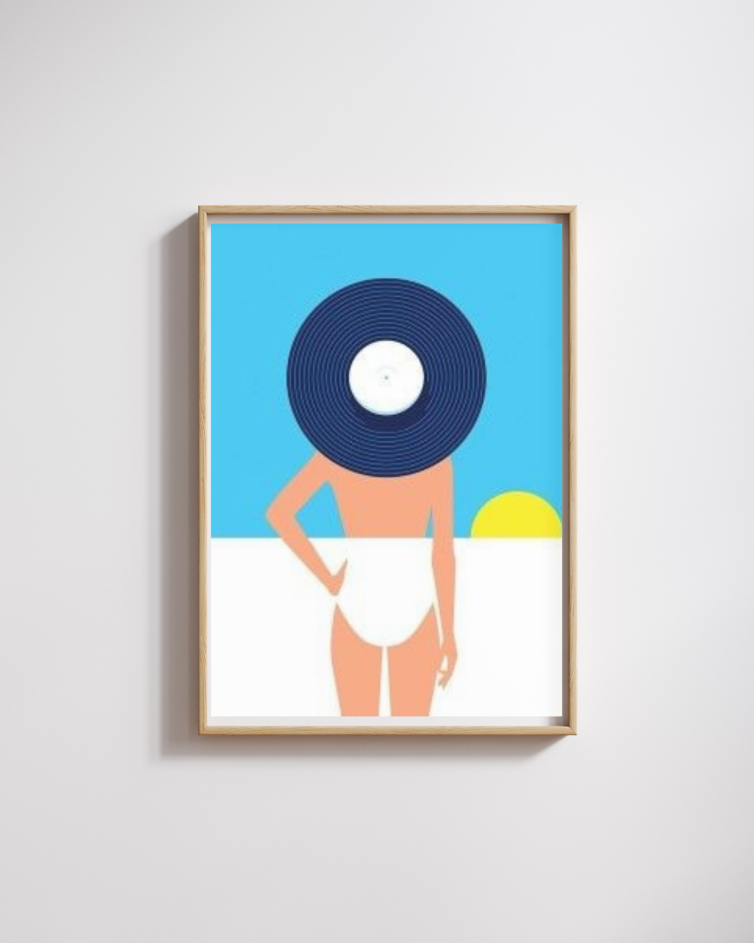 Framed artwork of a person in a swimsuit with a blue record on a white wall